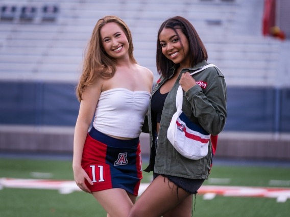 University of Arizona students model clothing and accesories from REPLAY Arizona, a vintage fashion line